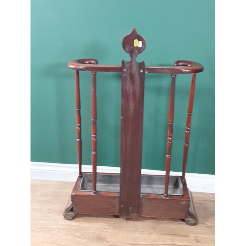 890 - A Victorian Stick/Umbrella Stand with turned supports and including a drip pan, 2ft 11in H (R6)