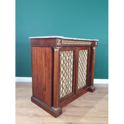 894 - A Regency rosewood and parcel gilt Cabinet, the variegated marble top above a pair  of grille doors ... 