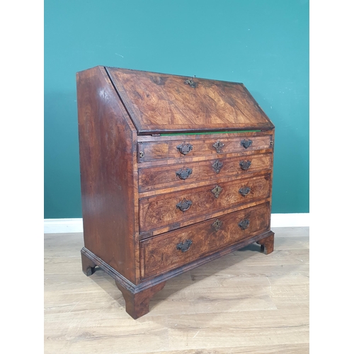 895 - An 18th Century crossbanded and herringbone inlaid figured walnut Bureau, the fall enclosing a fully... 