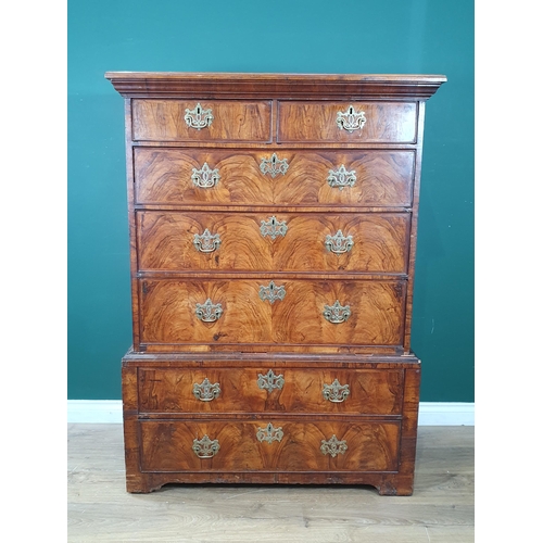 897 - An 18th Century figured walnut Chest on Chest, the moulded cornice above two short and three long dr... 