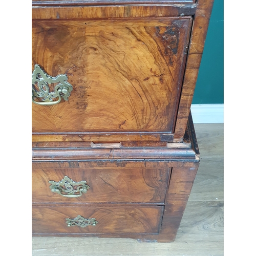 897 - An 18th Century figured walnut Chest on Chest, the moulded cornice above two short and three long dr... 