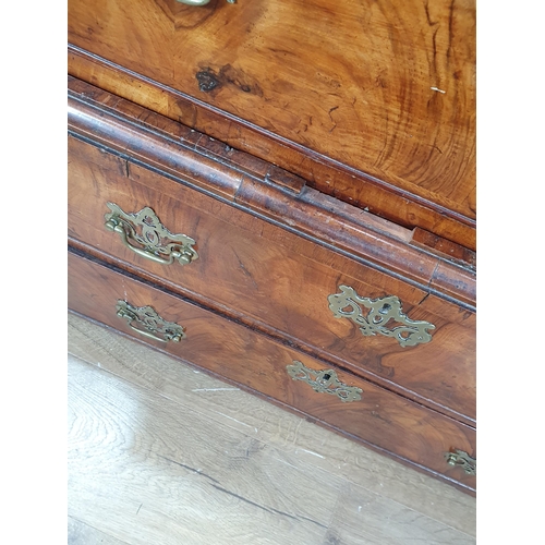 897 - An 18th Century figured walnut Chest on Chest, the moulded cornice above two short and three long dr... 