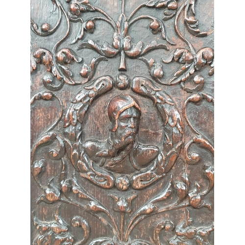 901 - A pair of Flemish 16th Century carved oak Panels with relief busts of a soldier and lady within trai... 