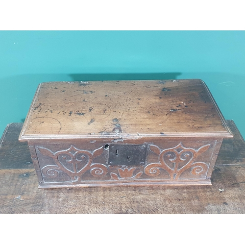 902 - A 17th Century West Country oak Book Box of small proportions with tulip and stylised floral design ... 