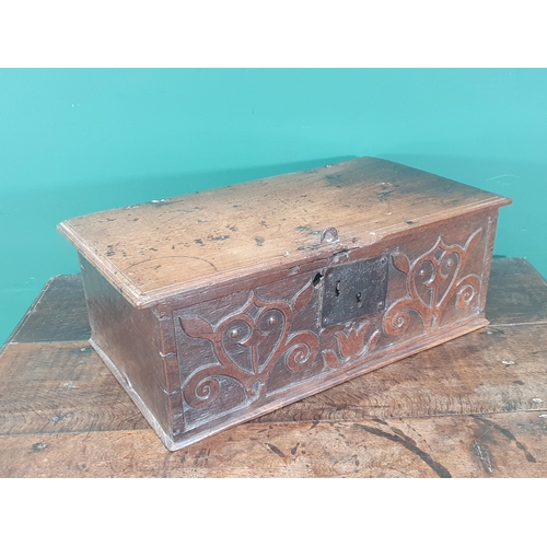 902 - A 17th Century West Country oak Book Box of small proportions with tulip and stylised floral design ... 