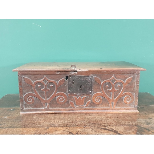 902 - A 17th Century West Country oak Book Box of small proportions with tulip and stylised floral design ... 