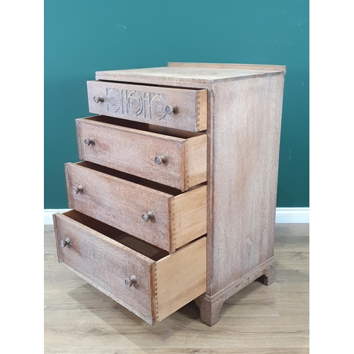 905 - A Heal's limed oak small Chest of Drawers, the top drawer with carved detail above three drawers on ... 