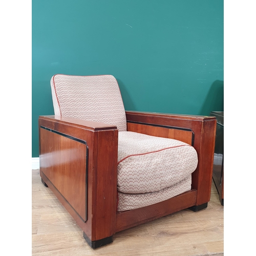 907 - A pair of Art Deco walnut Armchairs with upholstered backs and seats with rectangular arms and squar... 