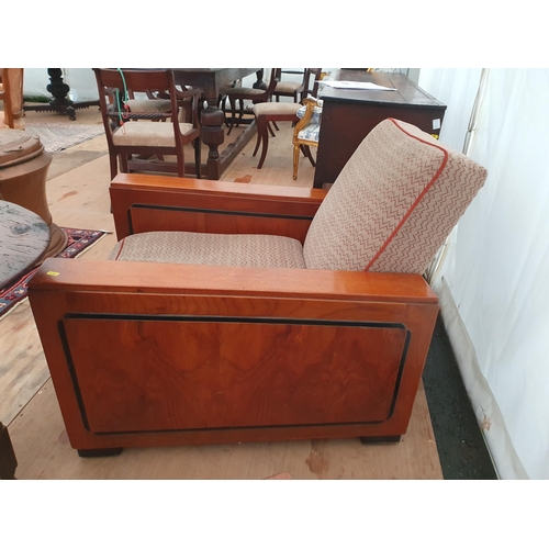 907 - A pair of Art Deco walnut Armchairs with upholstered backs and seats with rectangular arms and squar... 