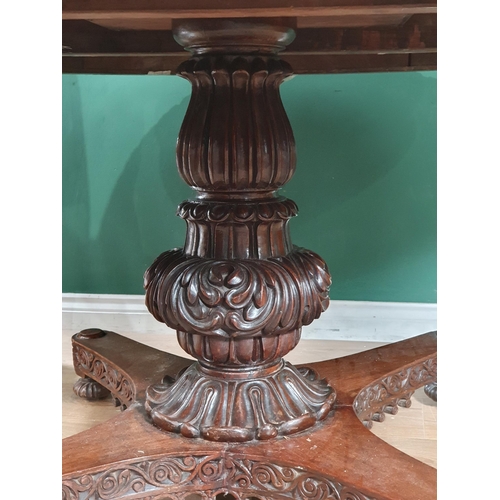 913 - A 19th century Colonial Centre Table with carved and moulded edge, the frieze carved leaves and rose... 