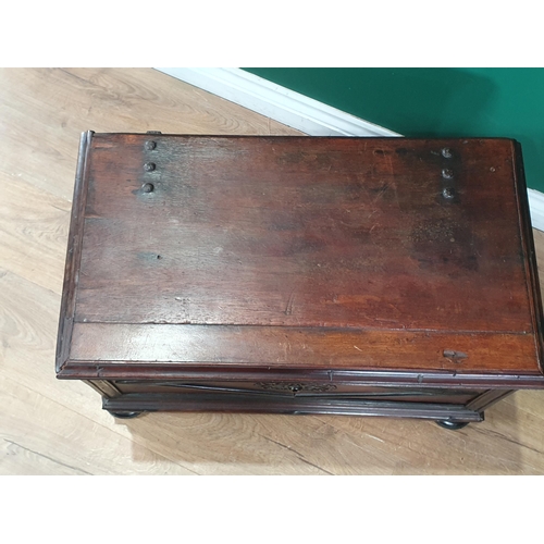 927 - A 19th Century small Continental walnut Coffer with moulded hinged cover, lozenge panels to the fron... 