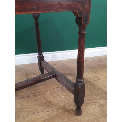 934 - An 18th Century oak Side Table with three piece top, single fitted drawer, above a shaped frieze, on... 