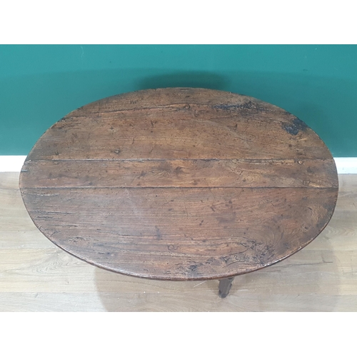 937 - A late 17th Century Coaching Table with elm oval top raised upon oak baluster and squared supports 3... 