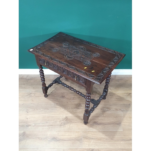 940 - An 18th Century oak Side Table with later carving, fitted frieze drawer on bobbin turned supports an... 