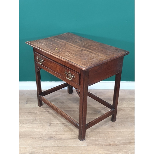 946 - An 18th Century oak Side Table with moulded top fitted frieze drawer above pierced corner brackets r... 