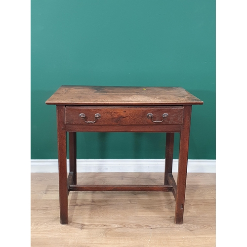 946 - An 18th Century oak Side Table with moulded top fitted frieze drawer above pierced corner brackets r... 