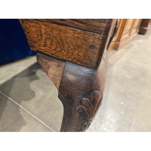 947 - An 18th Century oak Lowboy with moulded top above three drawers on a shaped frieze, raised on cabrio... 