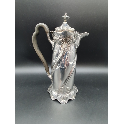 95 - An Edward VII Art Nouveau silver Coffee Pot with spiral leafage embossing, Sheffield 1901, 690gms al... 