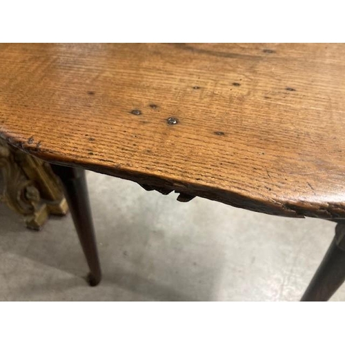 953 - An 18th Century oak and ash Cricket Table with shaped friezes and turned supports, 2ft diam (R1)