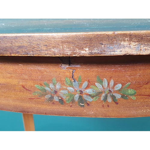 954 - An Edwardian small satinwood Occasional Table, the oval top painted musical instruments and flowers ... 