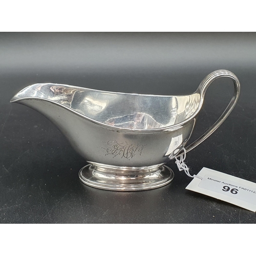 96 - A George III silver Cream Boat with reeded handle on oval pedestal base,  London 1788,