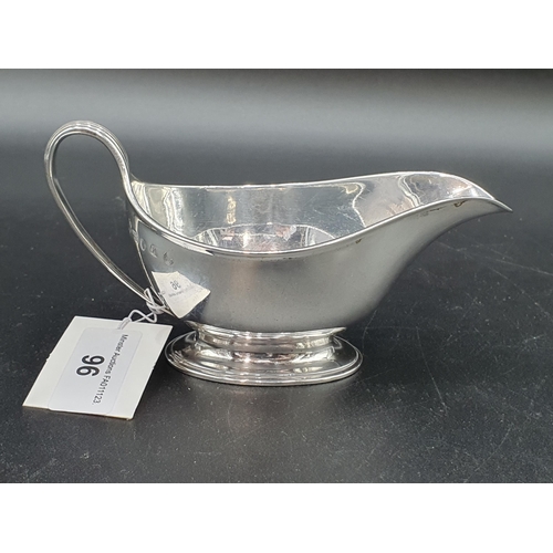 96 - A George III silver Cream Boat with reeded handle on oval pedestal base,  London 1788,