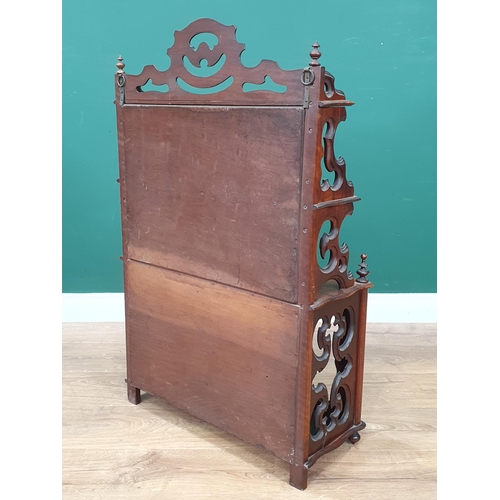 960 - A Victorian walnut Table Cabinet with mirror panels to the raised shelves and glass panels to the pa... 