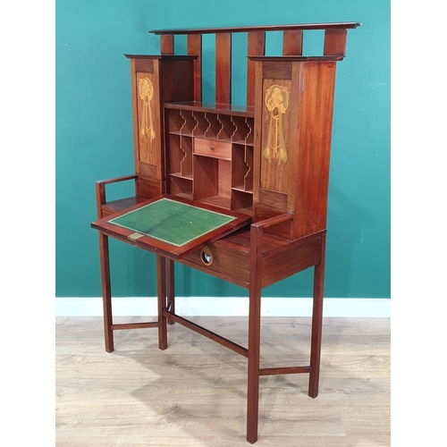 964 - An Arts and Crafts inlaid mahogany Secretaire designed by George Montague Ellwood, the central fall ... 