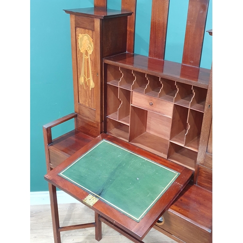 964 - An Arts and Crafts inlaid mahogany Secretaire designed by George Montague Ellwood, the central fall ... 