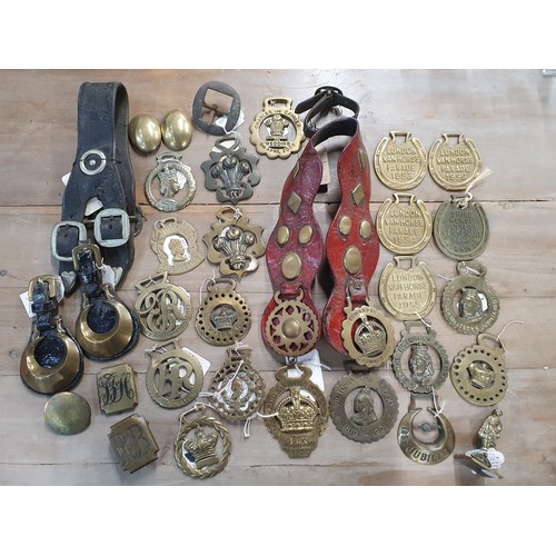 394 - A collection of assorted decorative Horse Brasses and Studs, and a brass souvenir Figure 