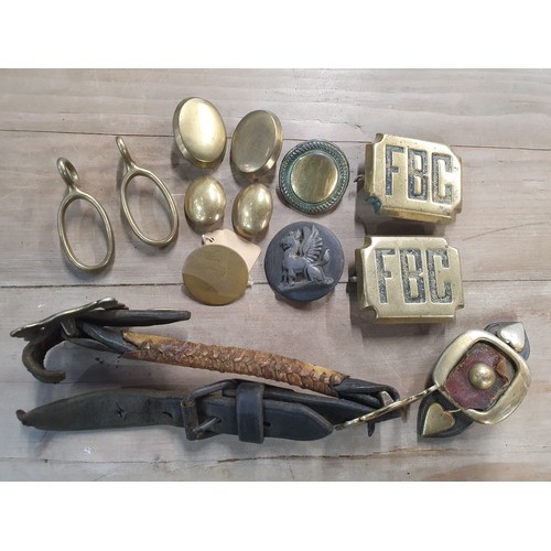 394 - A collection of assorted decorative Horse Brasses and Studs, and a brass souvenir Figure 