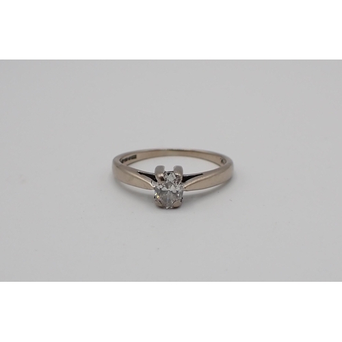 185 - A Diamond single stone Ring claw-set oval-cut stone, est 0.25cts, in 18ct white gold, ring size J 1/... 