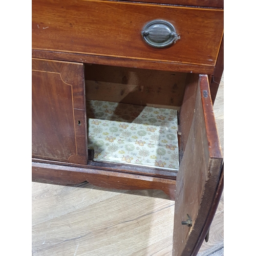 98 - A mahogany Cupboard fitted two long drawers above pair of cupboard doors on plinth base A/F, 2ft 4