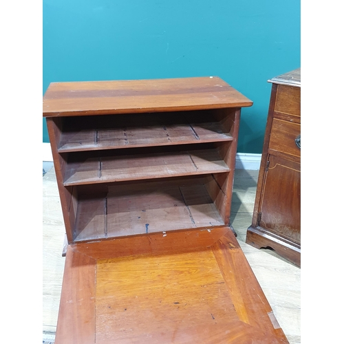 98 - A mahogany Cupboard fitted two long drawers above pair of cupboard doors on plinth base A/F, 2ft 4