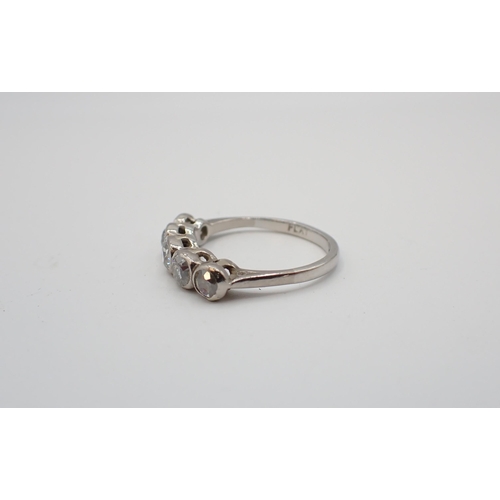 197 - A Diamond five stone ring rubover-set graduated old-cut stones, stamped PLAT, ring size N 1/2