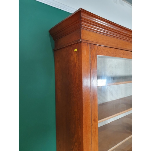 149 - An oak glazed top Dresser, with moulded cornice above pair of glazed doors enclosing three fitted sh... 