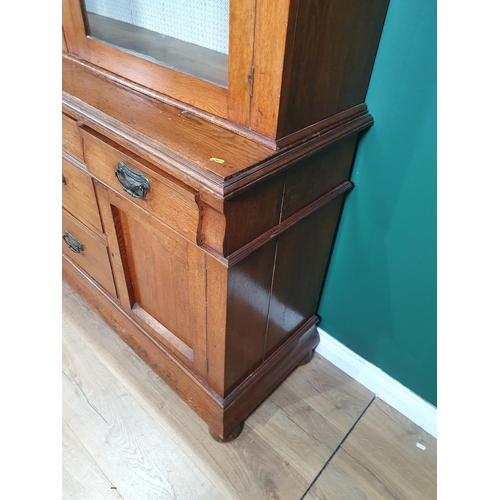 149 - An oak glazed top Dresser, with moulded cornice above pair of glazed doors enclosing three fitted sh... 