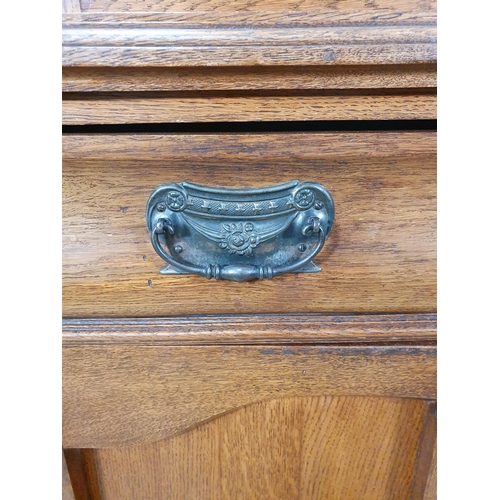 149 - An oak glazed top Dresser, with moulded cornice above pair of glazed doors enclosing three fitted sh... 