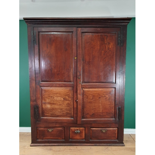 625 - A large antique oak Cupboard with a pair of panelled doors and with three drawers to the base, 6ft 1... 