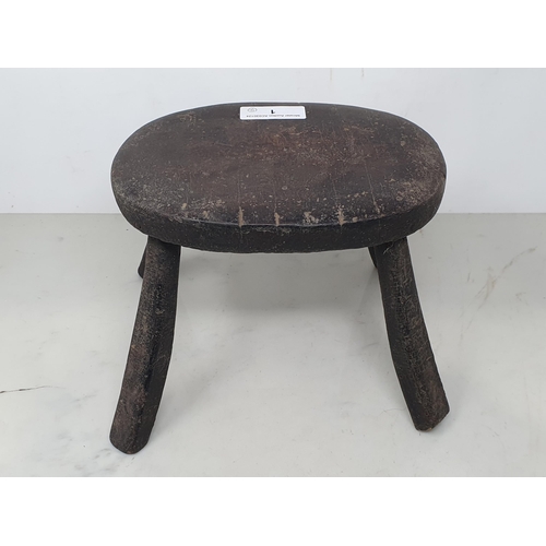 1 - An antique primitive Milking Stool 8 1/4in W x 6 1/2in H and a pair of treen miniature wooden Shoes ... 