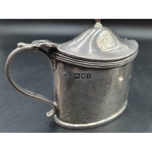 104 - An Edward VII silver oval Mustard Pot, London 1906, a Pepperette, Birmingham 1926 and a Thimble, Bir... 