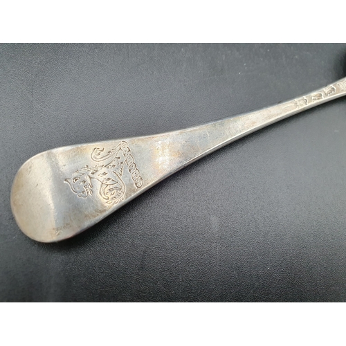 109 - A George II silver bottom marked Table Spoon Hanoverian pattern with shell pattern back, engraved cr... 