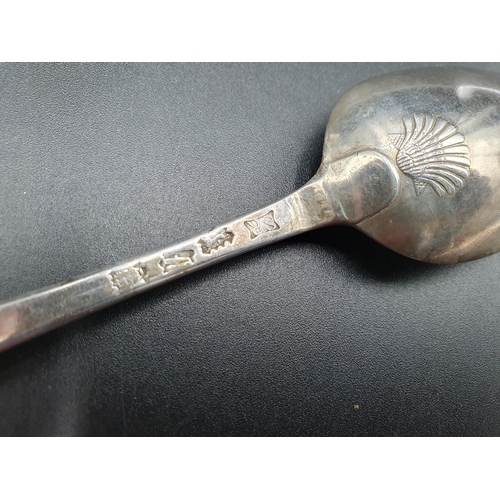 109 - A George II silver bottom marked Table Spoon Hanoverian pattern with shell pattern back, engraved cr... 