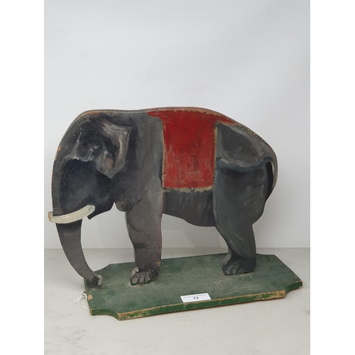 13 - A painted Dummy Board in the form of a Cat, a painted Elephant Model and two painted Figures.