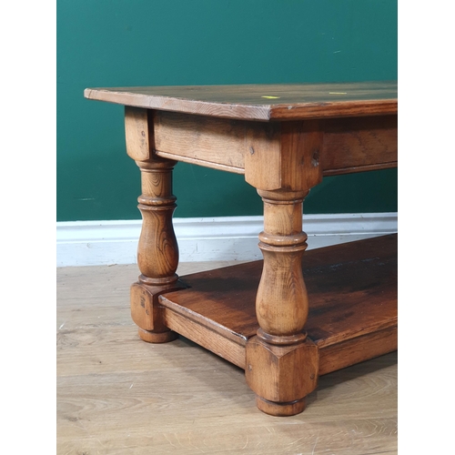 138 - An oak two tier Coffee Table 3ft W x 1ft 5in H (R6)