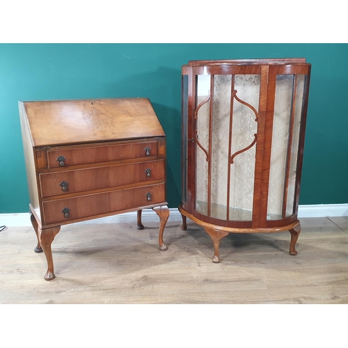 142 - A 1930's walnut veneered Display Cabinet 3ft 10in H x 2ft 6in W and a walnut veneered Bureau on cabr... 