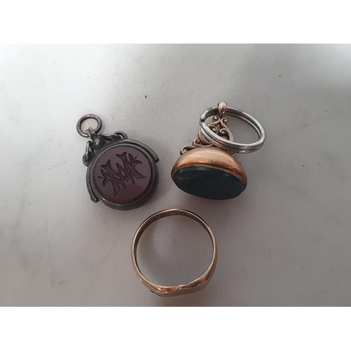 208 - An 18ct gold Signet Ring (5.2g), a yellow metal Fob Seal and another silver Seal