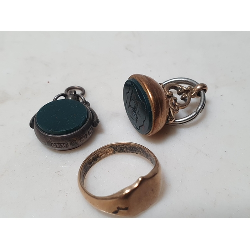 208 - An 18ct gold Signet Ring (5.2g), a yellow metal Fob Seal and another silver Seal