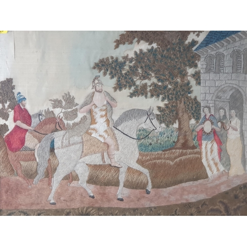 235 - An antique framed silk work depicting a Warrior on horseback 2ft 1in W x 1ft 9in H (R8)