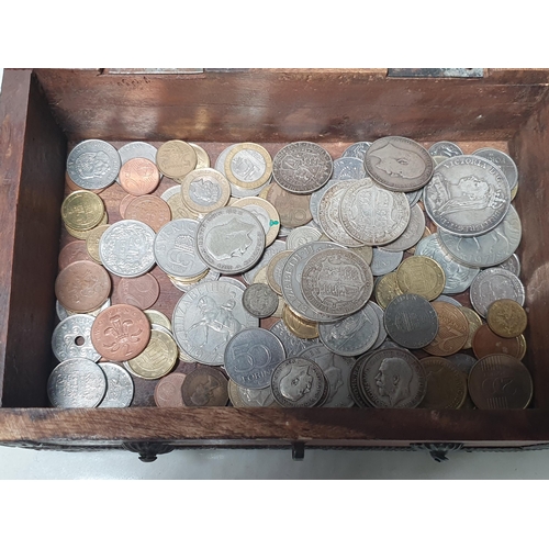 253 - A hardwood dome topped Box of British and World Coins, to include 1891 Crown, Half Crowns 1907, 2x 1... 